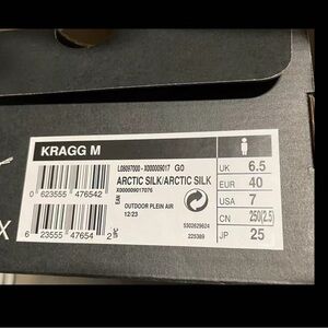 Arc'teryx Black and Silver Logo Display